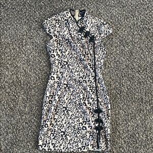 PrettyLittleThing Black and Cream Leopard Mini Dress